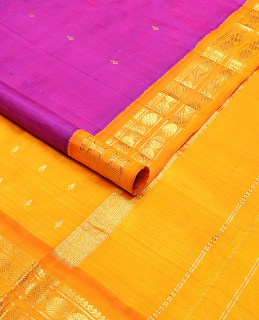 Purple buttas kancheepuram silk saree with contrast korvai border of thilakam mokku, paun design & zari design pallu
