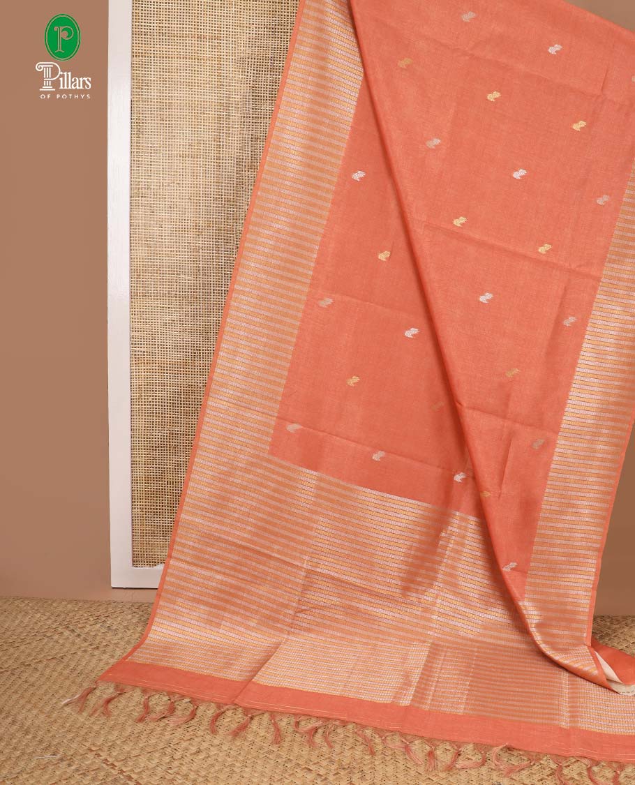Rust leaf design art tussar saree with diamond design border & rich pallu along with butta design blouse