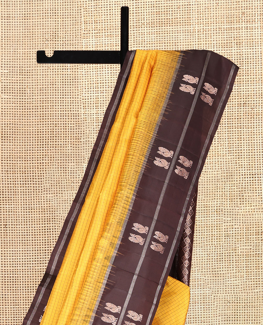 Yellow Checked Kanchipuram Silk Saree, a Contrast Border of Peacock Buttas, Grand Jaal Pallu, and a Contrast Blouse