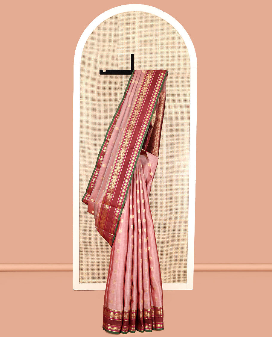 Pink Vasundhara Lite Silk Mix Saree, Decked Up with Mayil-Chakram Buttas, a Contrast Traditional Rettai Pettu Border, Pallu of Mayil-Yaanai Butta Enclosed Checks, and a Contrast Blouse