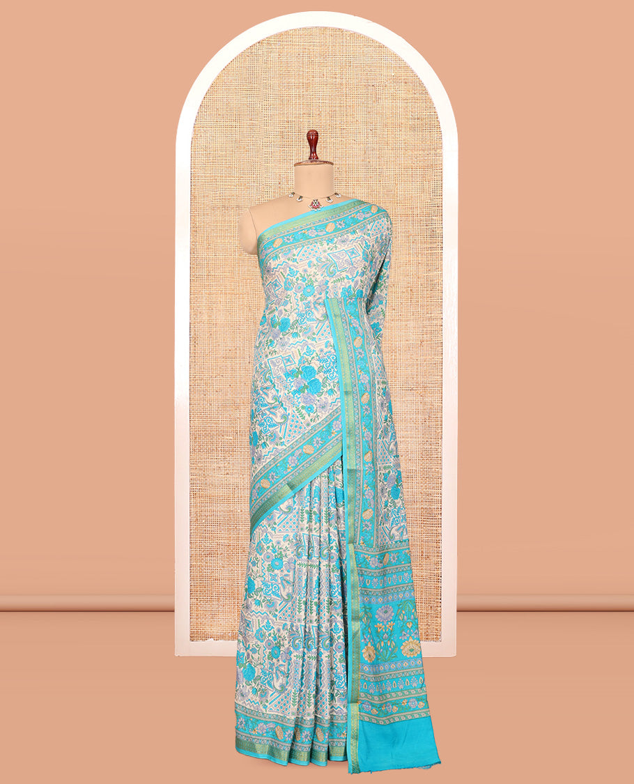 Blue Printed Silk Saree, Embellished with Intricate Floral Print, a Traditional Zari Border, Floral Pallu, and a Matching Blouse