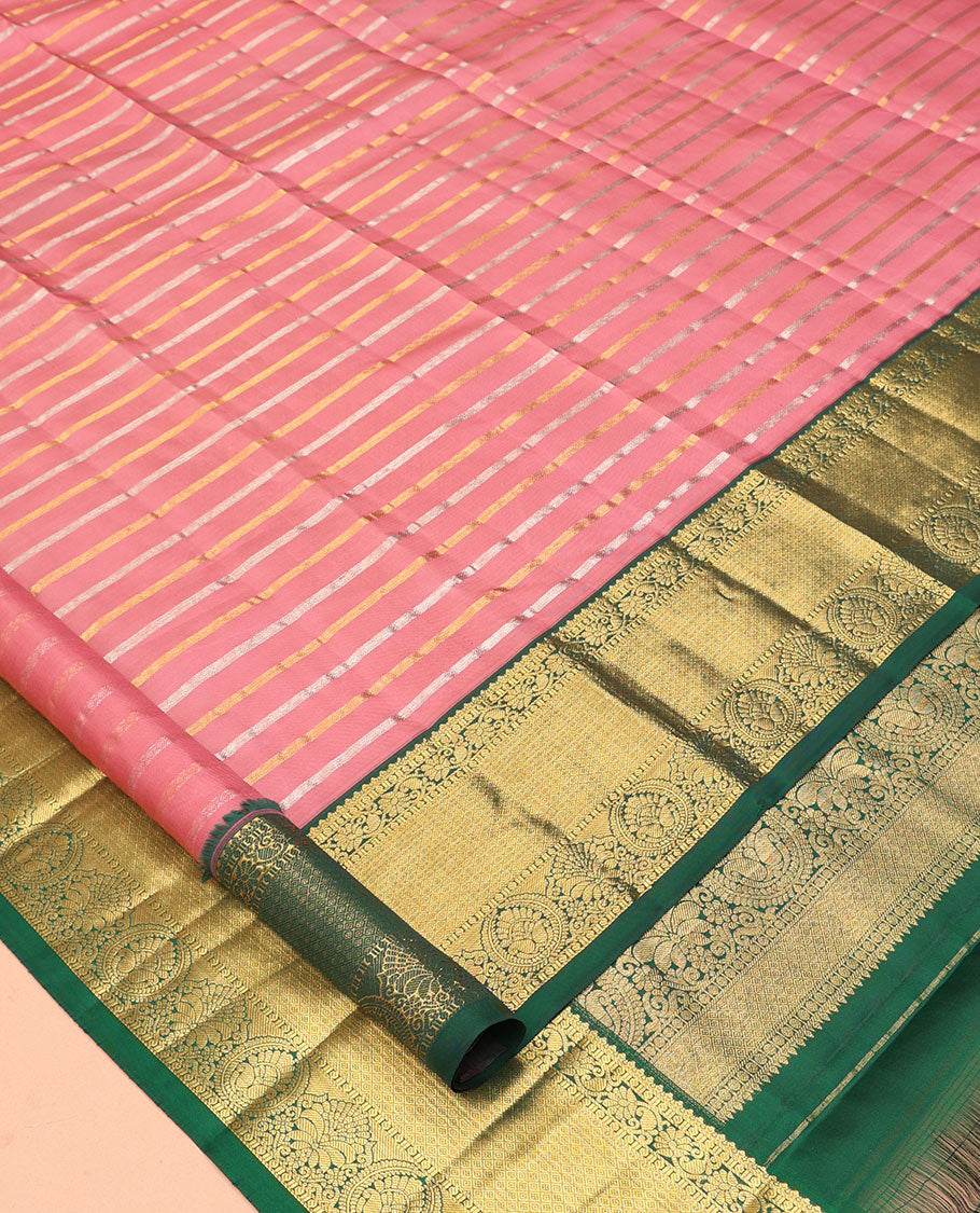 Pink Vasundhara Silk Saree, Embellished with Zari Stripes, a Contrast Border of Jaal, and Chakram Designs, a Diagonally Striped Pallu, and a Contrast Blouse