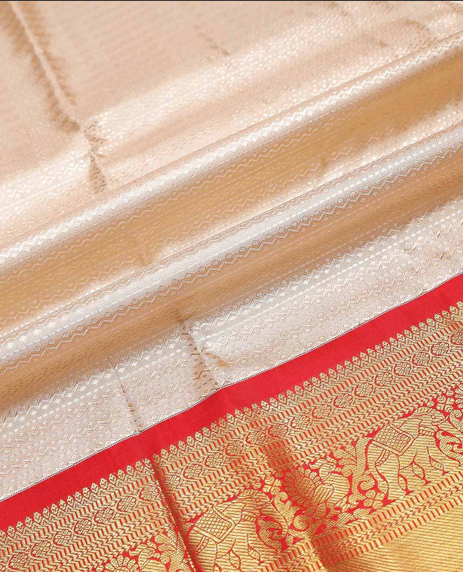 Baby pink geometric design silk half saree with contrast border of thilakam mokku, paunm mayil, yanaai design,zari design blouse & zari design border dhavani