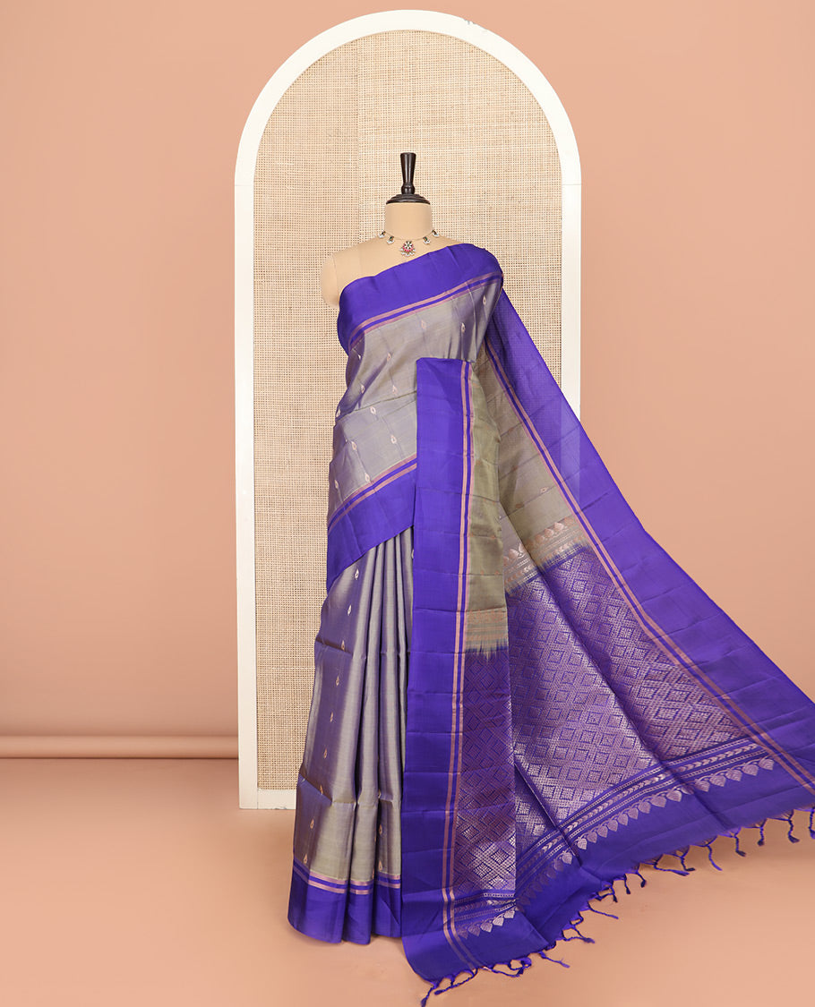 Grey Semi Uppada Saree Prettified with Zari Buttas, Complemented by a Contrast Zari Striped Border, Majestically Detailed Pallu of Jaal Designs, and Paired with a Contrast Blouse
