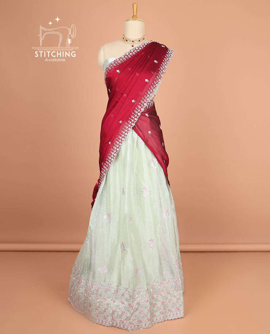 Light green floral motifs thread embroidery half saree with floral embroidery border , floral motifs blouse & floral embroidery scallop border dhavani