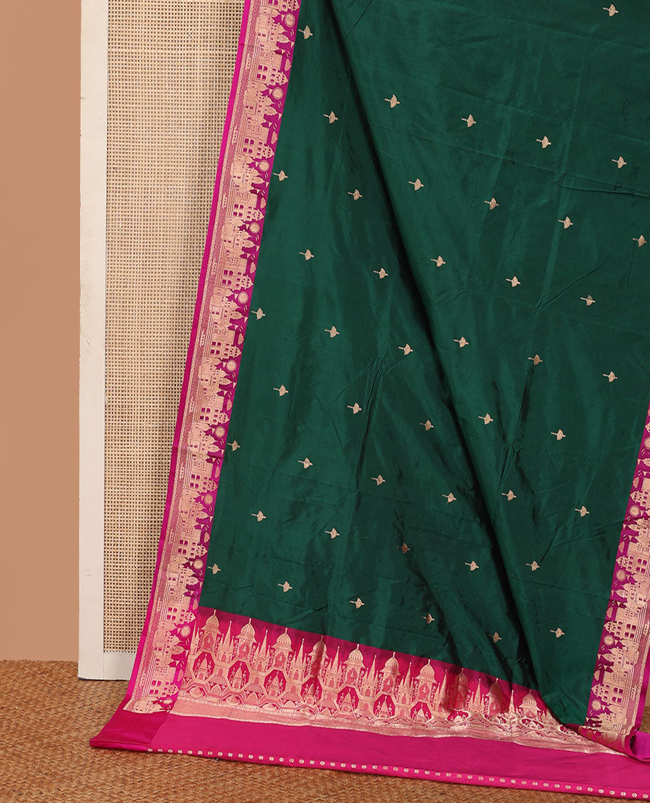 Dark green zari buttas katan silk saree, contrast Mughal style buildings featured border, and pallu mirroring the same border design