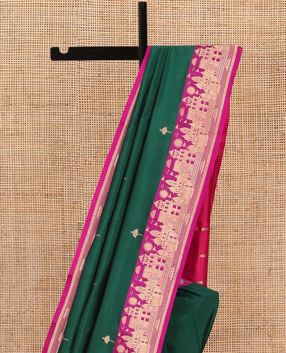 Dark green zari buttas katan silk saree, contrast Mughal style buildings featured border, and pallu mirroring the same border design