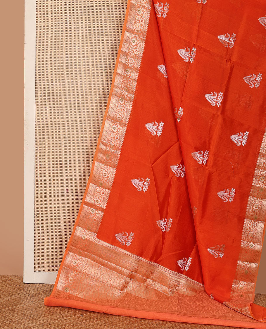Red floral buttas raw mango silk saree, contrast traditional zari design border, and intricate pallu