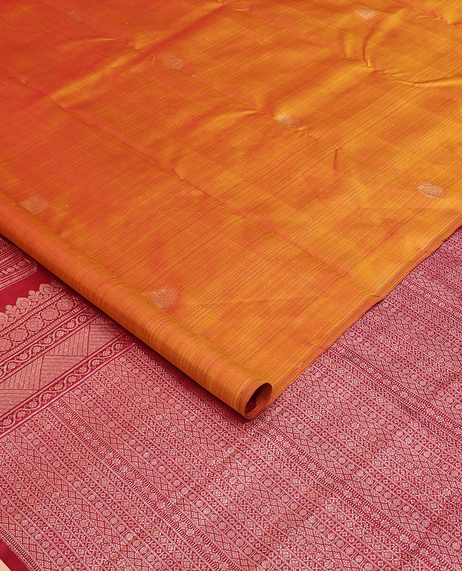 Borderless orange manga zari buttas Kanchipuram silk saree, contrast geometric patterned pallu