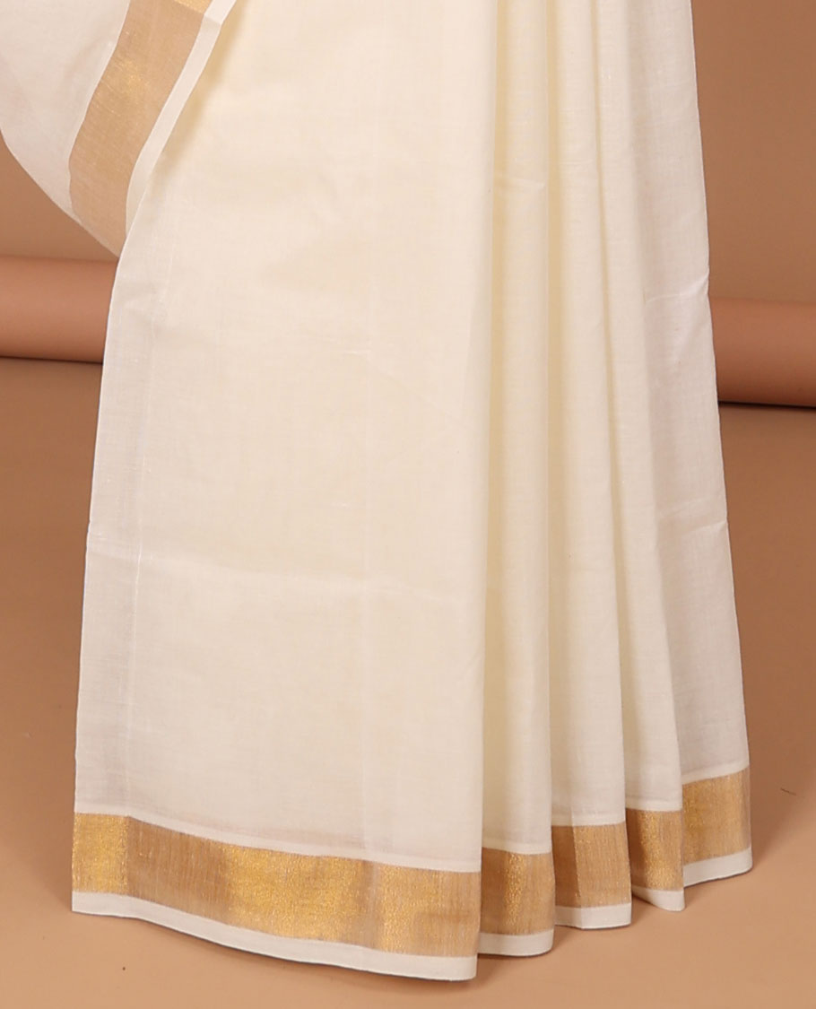 Cream kerala saree, zari border & pallu of butterflies in zari