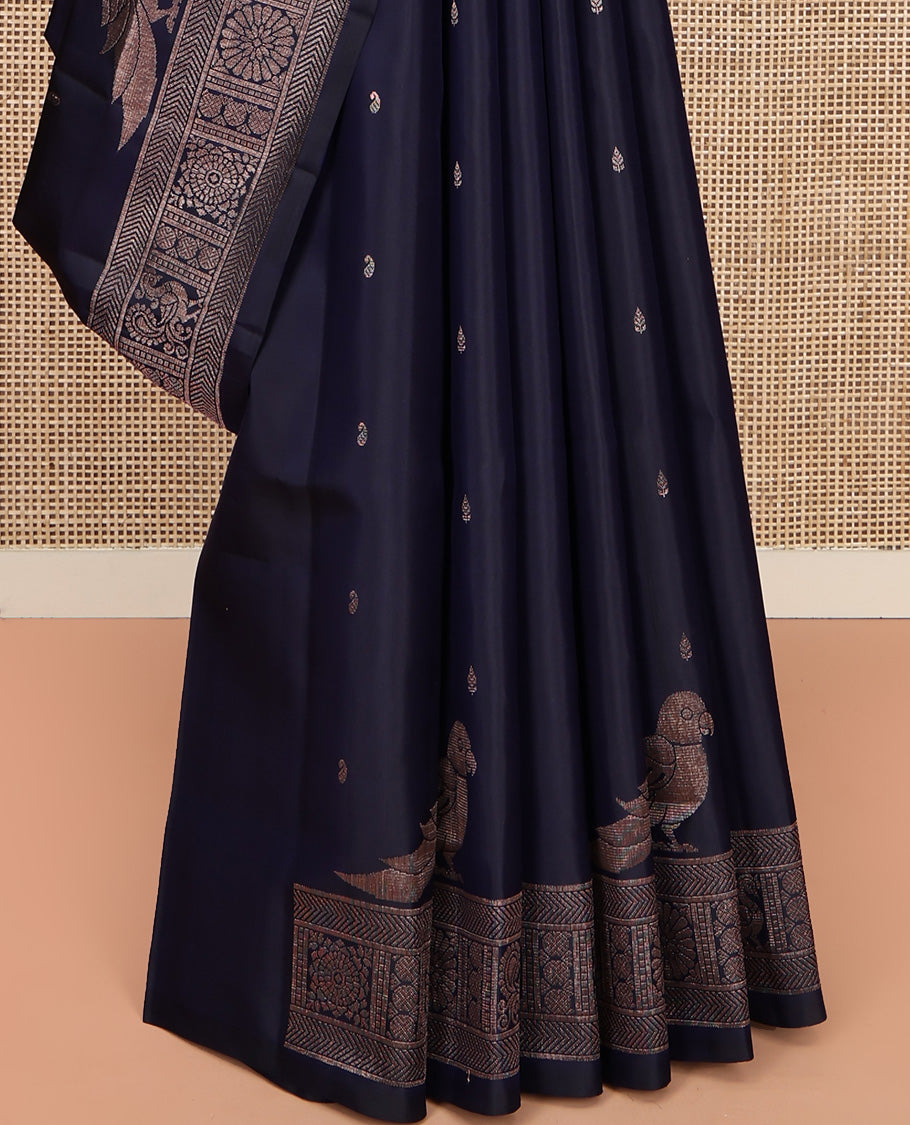 Blue Mayuri Soft Silk Saree, Finely Crafted with Buttas All Over Its Body, Highlighted by Self-Border of Parrot, Chakram, and Mayil Designs, Pallu Steeped with Parrot Designs, and Paired with a Matching Blouse
