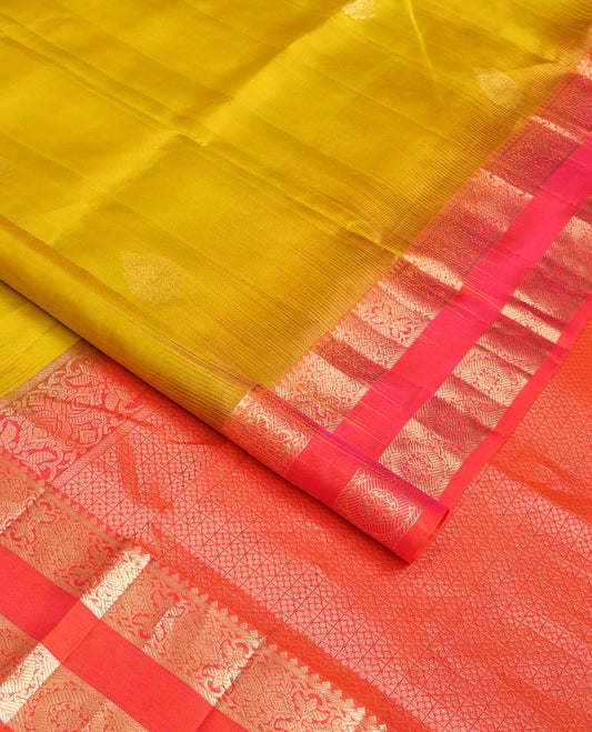 Yellow zari buttas soft silk saree, contrast rettai pettu border of thilakam,banaras & chakram designs & jaal pallu