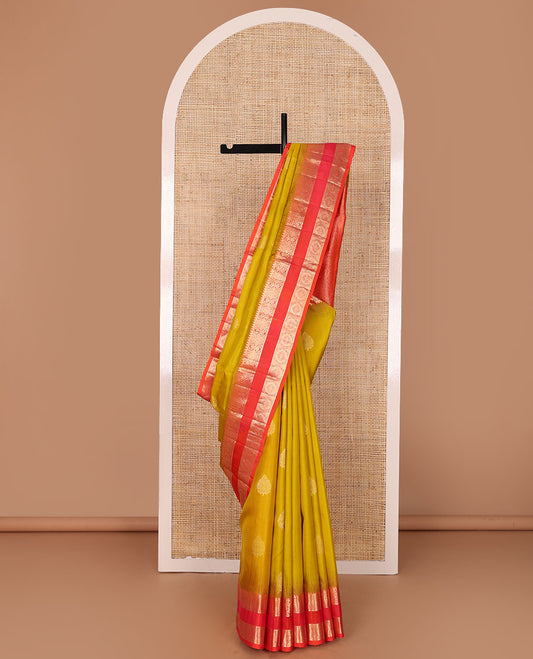 Yellow zari buttas soft silk saree, contrast rettai pettu border of thilakam,banaras & chakram designs & jaal pallu