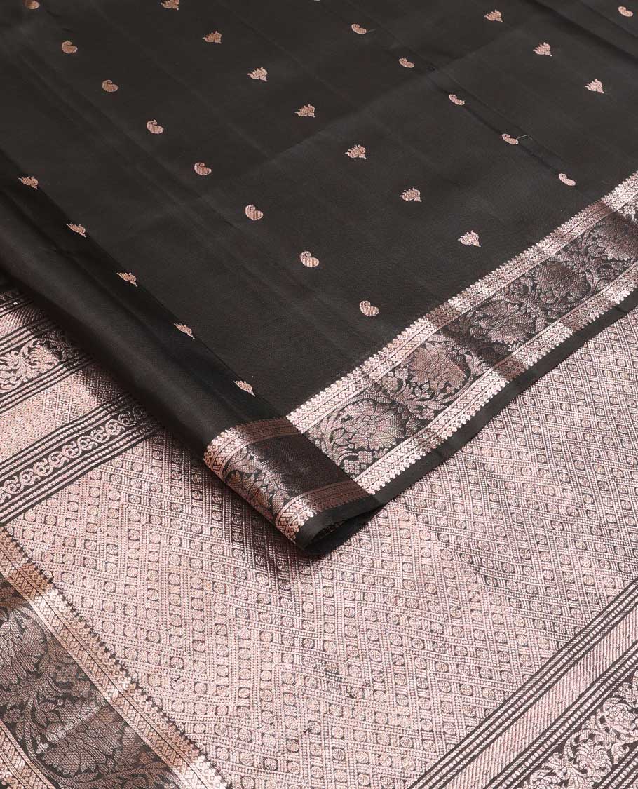 Black manga and pichwai lotus buttas soft silk saree, zari border of thilakam mokku and kodi visiry designs, and intricate pallu