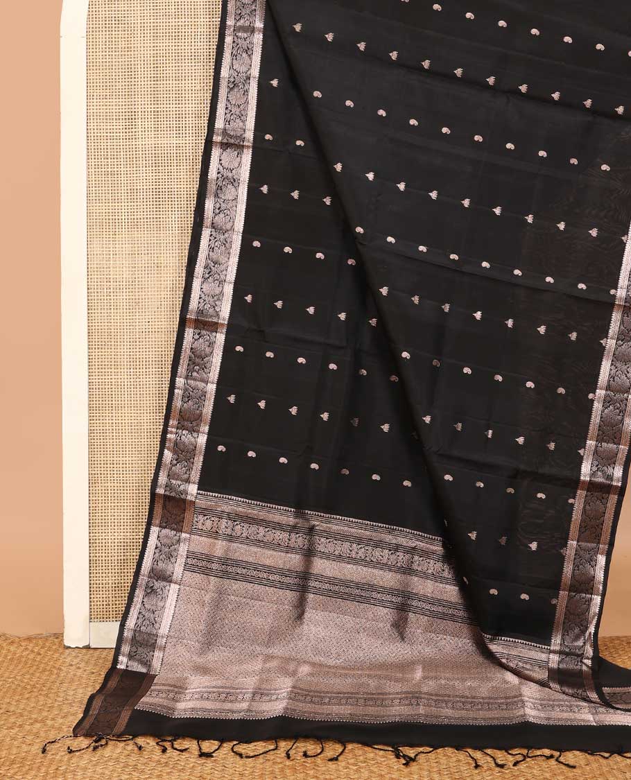 Black manga and pichwai lotus buttas soft silk saree, zari border of thilakam mokku and kodi visiry designs, and intricate pallu