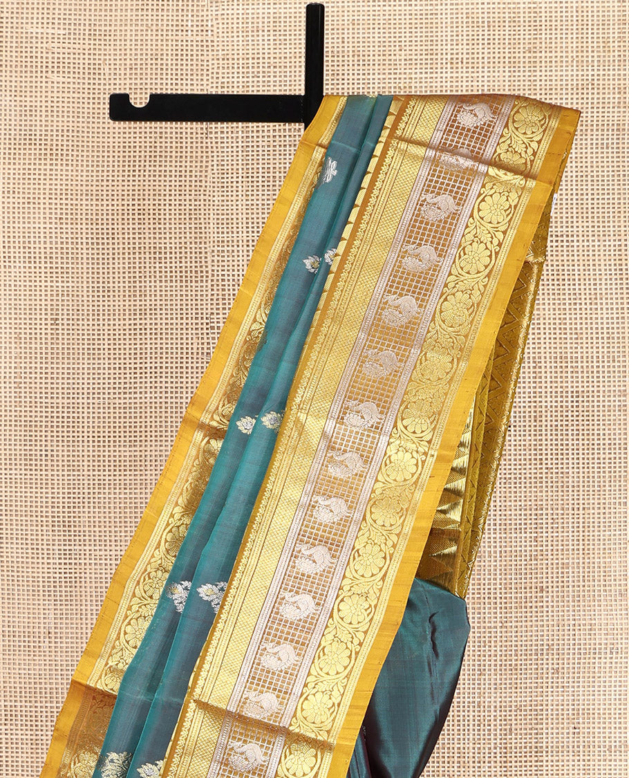 Green Venkatagiri Silk Saree, Detailed with Zari Buttas All Over Its Body, Complemented by a Contrast Traditional Zari Design Border, Grand Jaal Pallu, and Paired with a Contrast Blouse