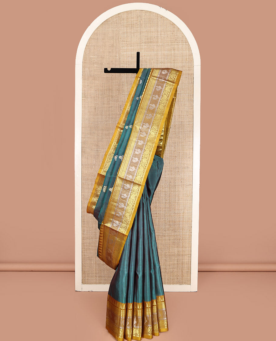 Green Venkatagiri Silk Saree, Detailed with Zari Buttas All Over Its Body, Complemented by a Contrast Traditional Zari Design Border, Grand Jaal Pallu, and Paired with a Contrast Blouse
