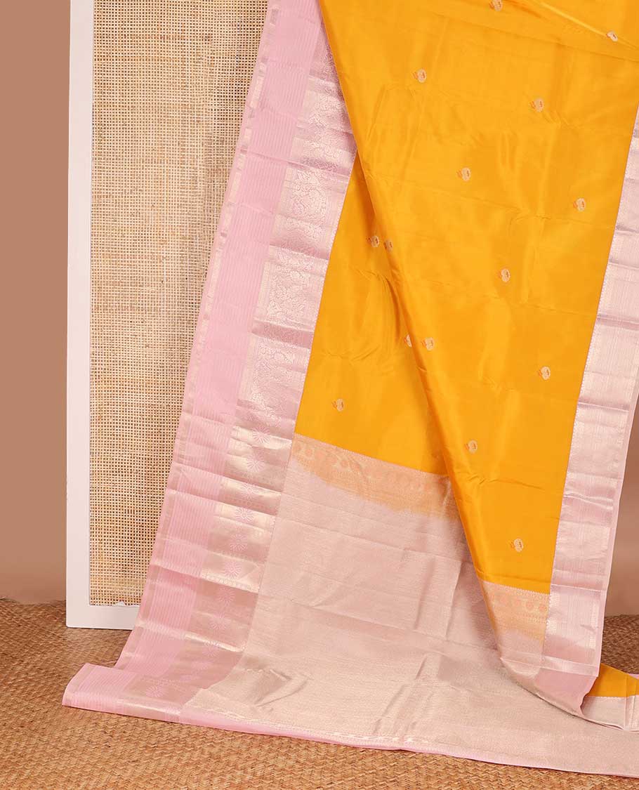 Mango yellow meena buttas silk saree, contrast traditional zari border and pallu of zari rich jaal designs