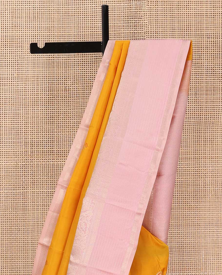 Mango yellow meena buttas silk saree, contrast traditional zari border and pallu of zari rich jaal designs
