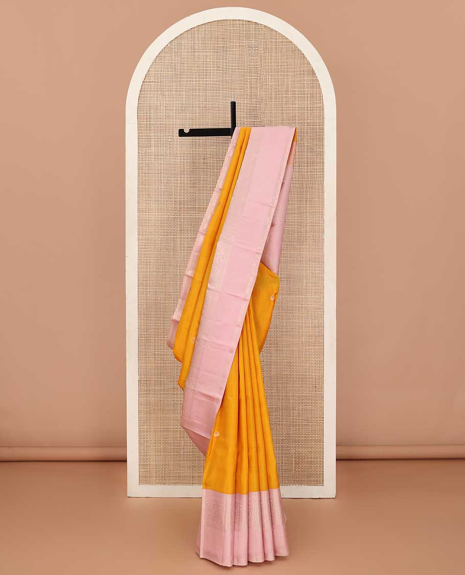 Mango yellow meena buttas silk saree, contrast traditional zari border and pallu of zari rich jaal designs