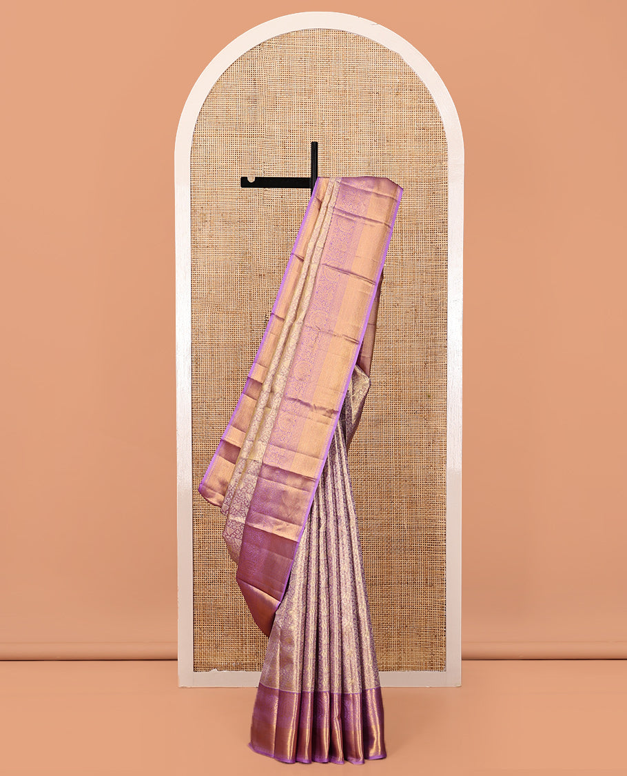 Lavender Kanchipuram Tissue Silk Saree, Elegantly Highlighted with Jacquard Design, Complemented by Contrast Border of Thilakam Mokku, and Vanki Designs, Grand Pallu, and Matching Blouse