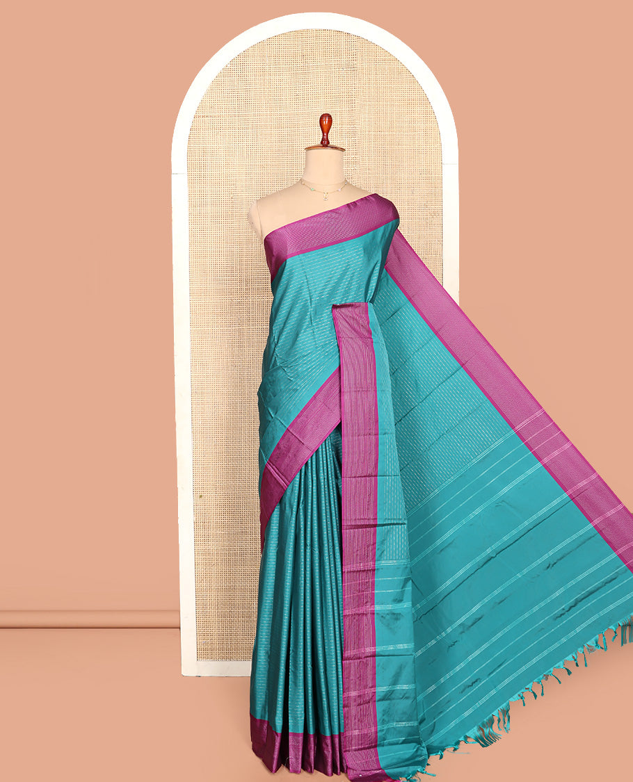 Blue Aarani Silk Saree, Enriched with Zari Stripes All Over Its Body, Complemented by a Contrast Zari Striped Border, Pallu of Stripes, and Paired with a Matching Blouse