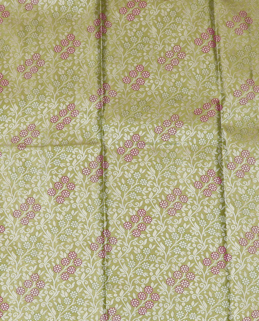 Green Art Silk Half-Saree Richly Detailed with Jacquard Designs on Its Skirt, Complemented by a Contrast Meenakari Border, Paired with a Contrast Jacquard Blouse, and Featuring a Dhavani Adorned with Paisley Motifs