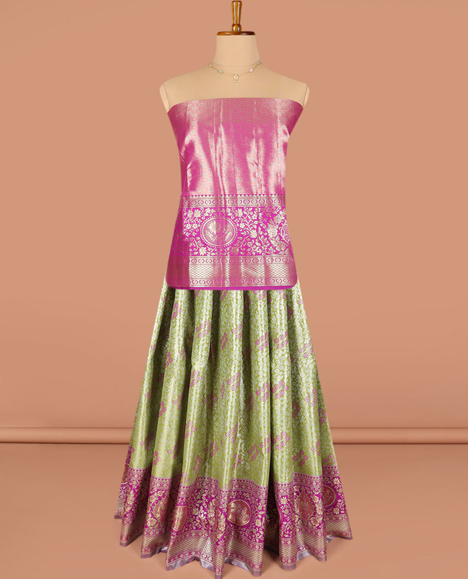 Green Art Silk Half-Saree Richly Detailed with Jacquard Designs on Its Skirt, Complemented by a Contrast Meenakari Border, Paired with a Contrast Jacquard Blouse, and Featuring a Dhavani Adorned with Paisley Motifs