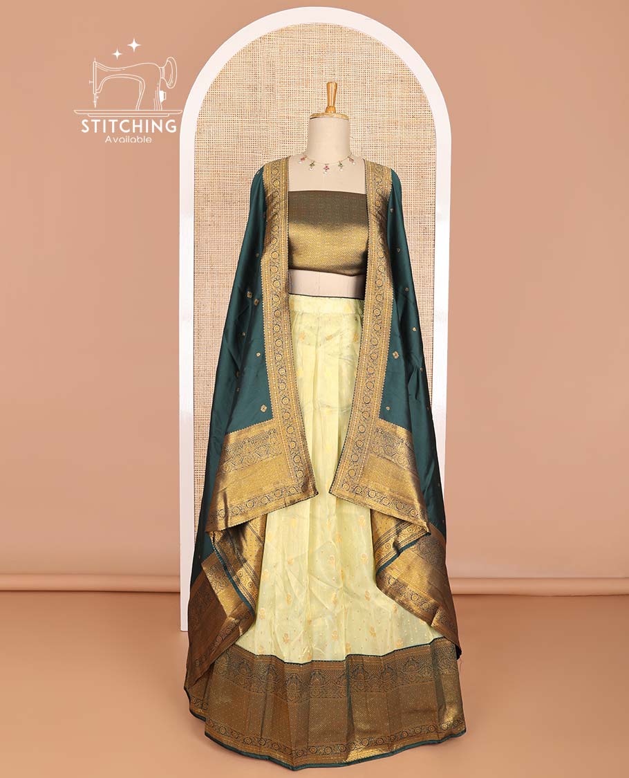 Lemon yellow buttas half saree with contrast intricate zari design border, jaal design blouse & floral design dhavani