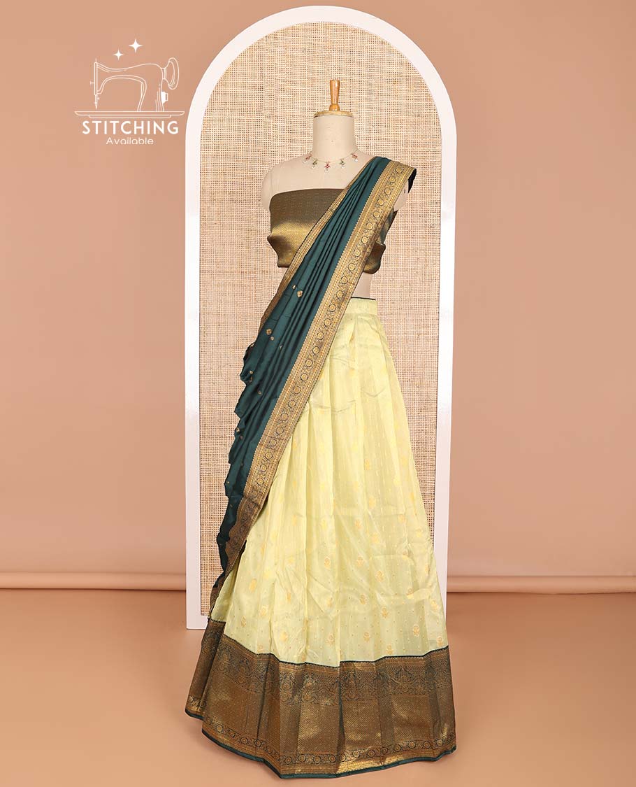 Lemon yellow buttas half saree with contrast intricate zari design border, jaal design blouse & floral design dhavani