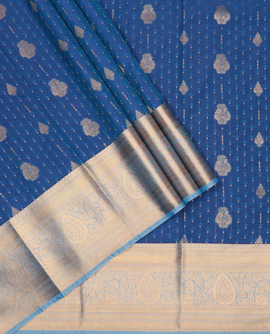 Blue art silk pavadai material, zari buttas with embossed contrast traditional zari border skirt, and contrast blouse