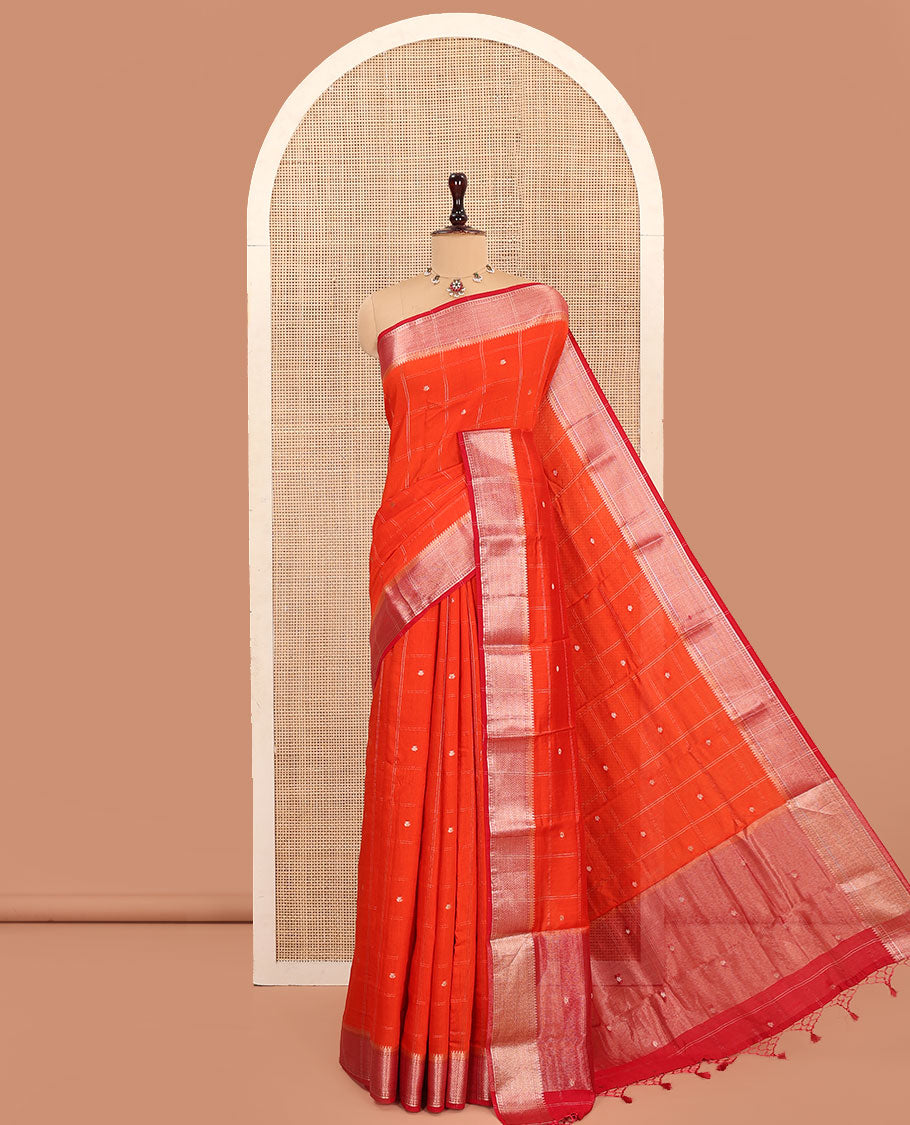 Orange Assam Silk Saree, Highlighted by Zari Butta Enclosed Checked Design, Complemented by Contrast Zari Border of Traditional Designs, Pallu Features Zari Designs, and Paired with a Contrast Blouse