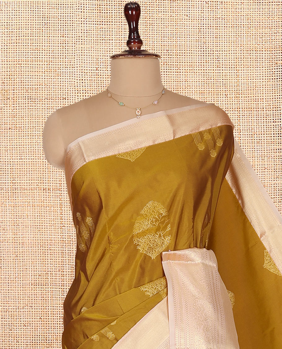 Mustard Budget Silk Saree, Sparsely Woven with Zari Buttas on Its Body, Complemented by a Contrast Traditional Zari Design Border, Intricately Designed Pallu, and Paired with a Contrast Blouse