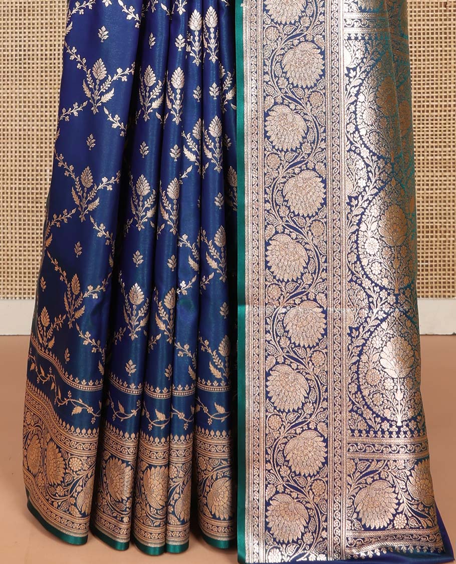 Blue Semi-Banaras Saree, Gracefully Embellished with Jaal Jacquard on Its Body, Highlighted by a Floral Creeper Design Border, Intricately Designed Zari Pallu, and Paired with a Matching Blouse