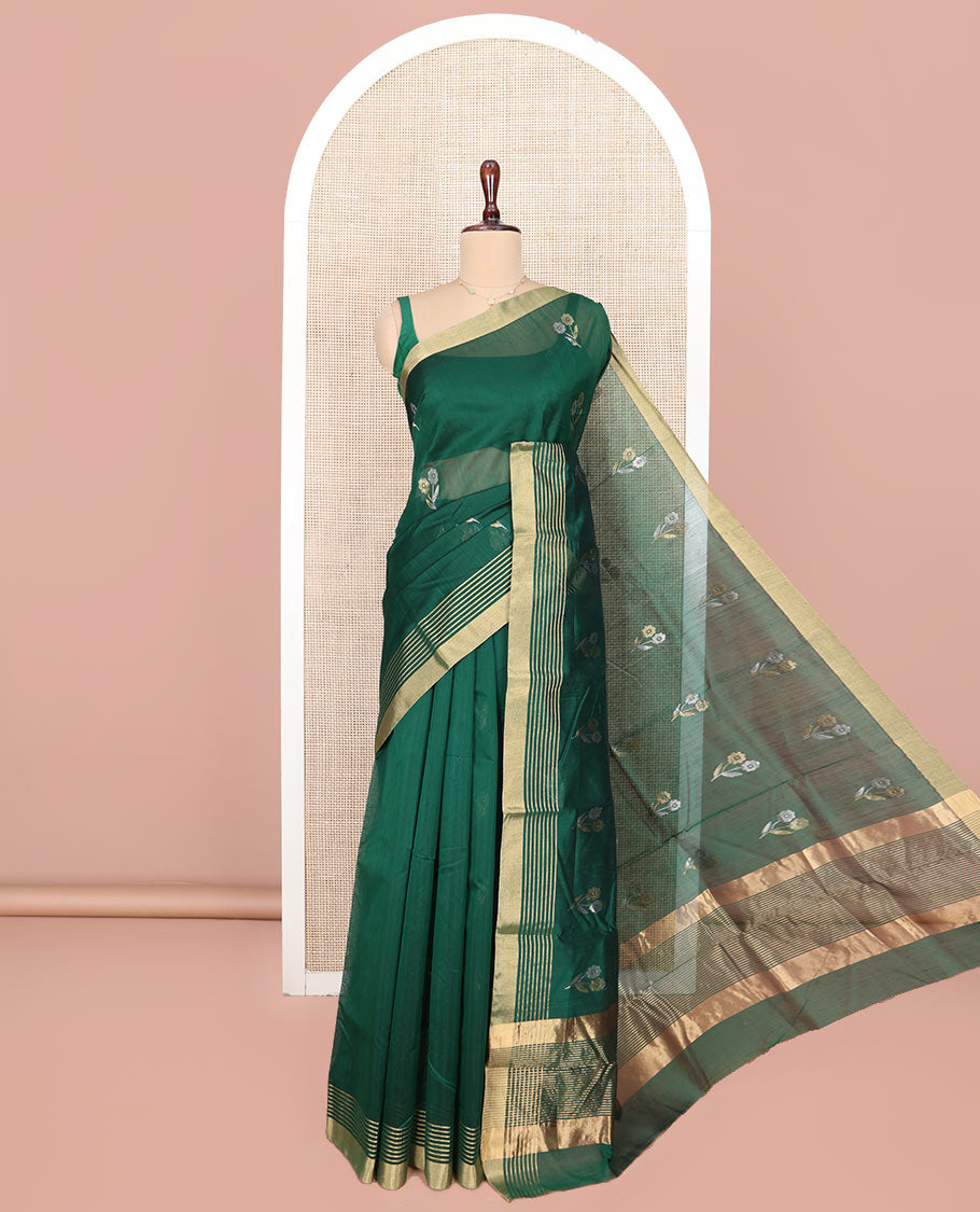 Green Chanderi Cotton Saree, Delicately Woven with Floral Buttas All Over Its Body, Highlighted by Zari Border, Pallu of Stripes, and Paired with a Matching Blouse