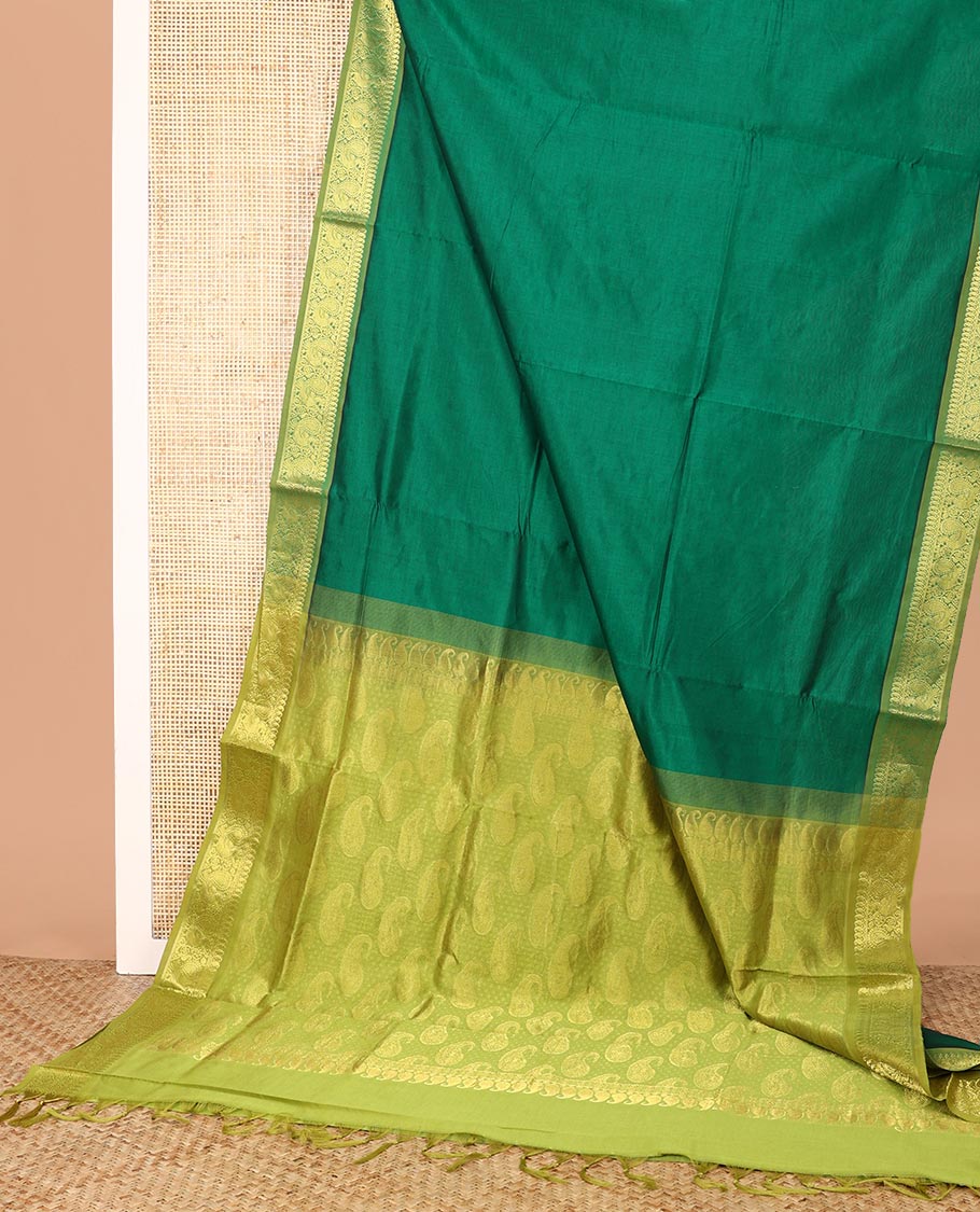 Green Plain Poly Cotton Saree, Complemented by a Contrast Traditional Zari Border of Peacock Designs, Pallu Steeped with Paisley Designs, and Paired with a Contrast Blouse