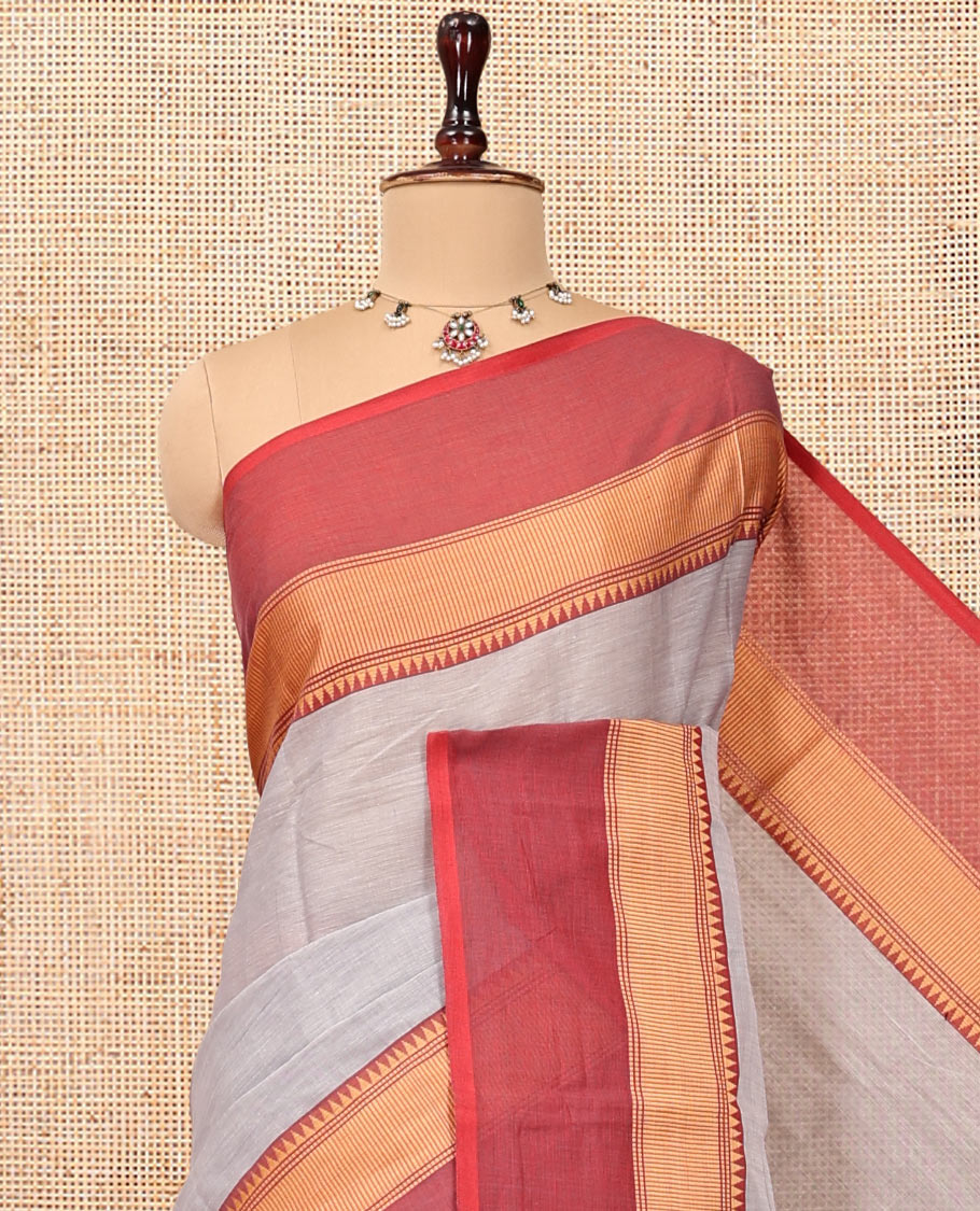 Grey Plain Chettinad Cotton Saree, Complemented by Contrast Temple Traditional Thread Border, Striped Pallu, and a Matching Blouse