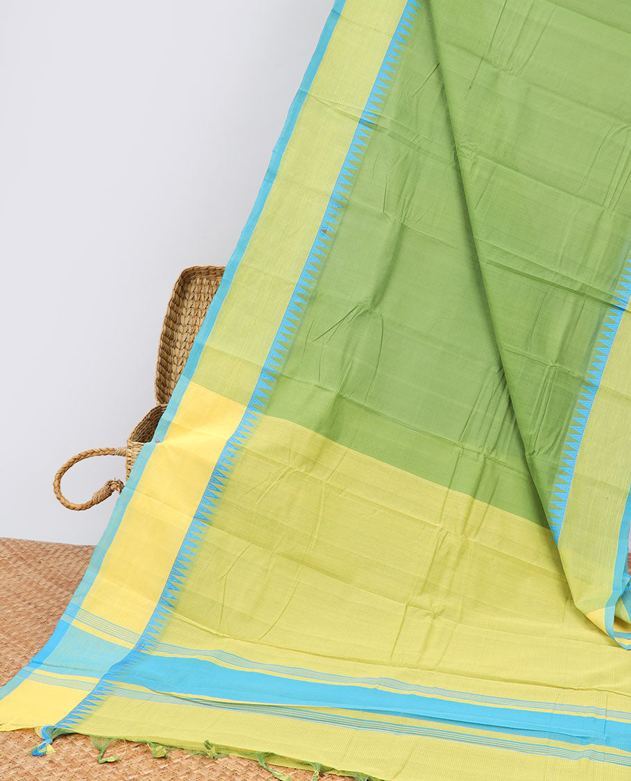 Green khadi cotton saree with contrast temple border & striped pallu