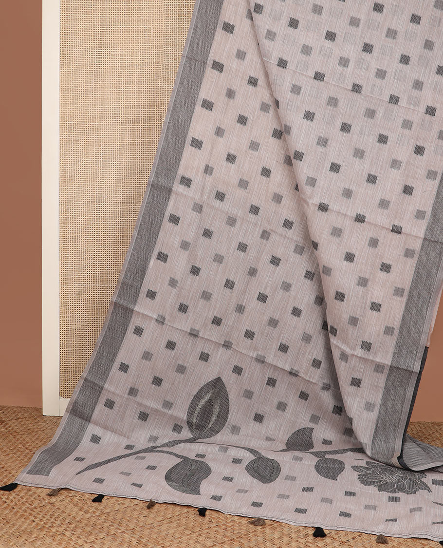 Beige square buttas woven cotton saree, contrast plain border and pallu features a pink flower with stem motifs