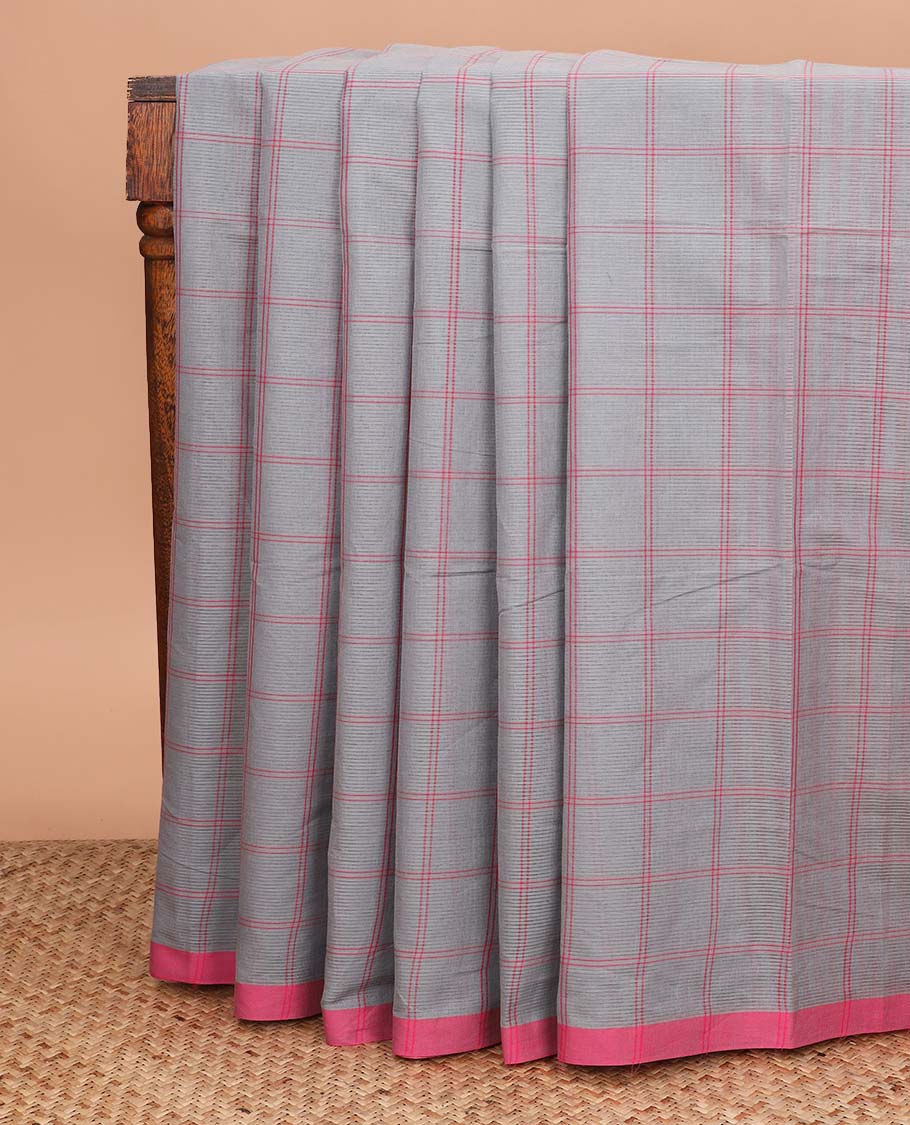 Grey checked Mangalagiri cotton saree with contrast border, striped pallu, and a contrast kalamkari floral printed blouse