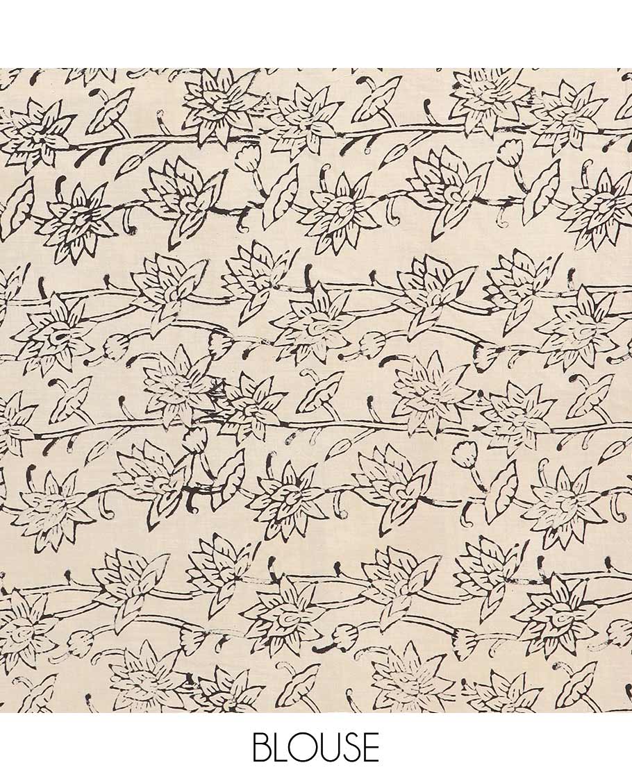 Black floral vine machine-printed Kalamkari cotton saree, geometric printed border, and geometric printed pallu