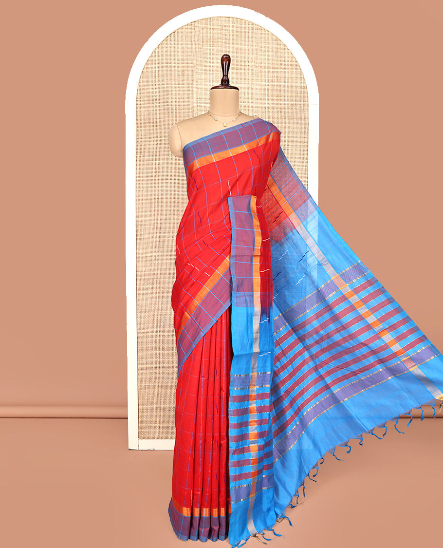 Red Poly Cotton Saree, Bedecked with Butta Enclosed Checks on Its Body, Complemented by Contrast Border, Pallu Steeped with Stripes, and Paired with a Contrast Blouse