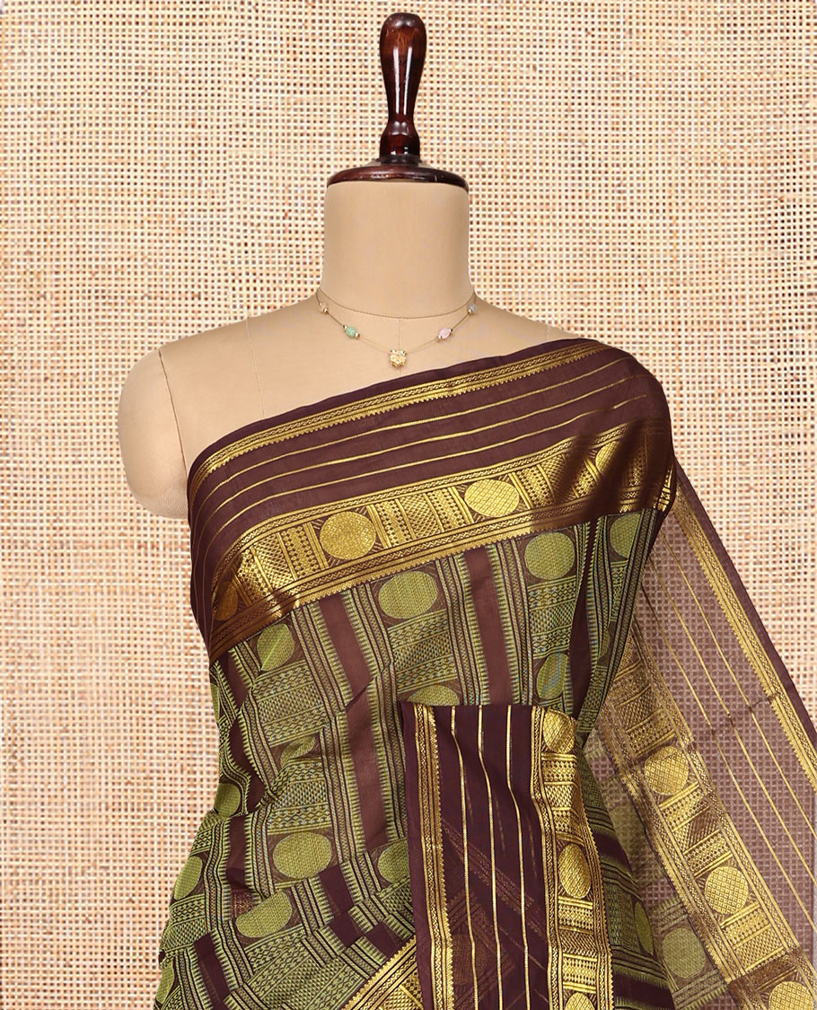 Brown Coimbatore Cotton Saree, Steeped in the Richness of Geometric Design on Its Body, Highlighted by Traditional Zari Border, Striped Pallu, and Paired with a Matching Blouse