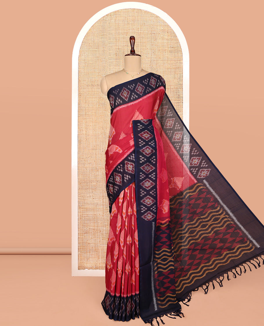 Red Ikkat Cotton Saree, Decorated with Ikkat-style Buttas All Over Its Body, Complemented by a Contrast Ikkat-Textured Border, Pallu of Geometric Patterns, and Paired with a Contrast Blouse