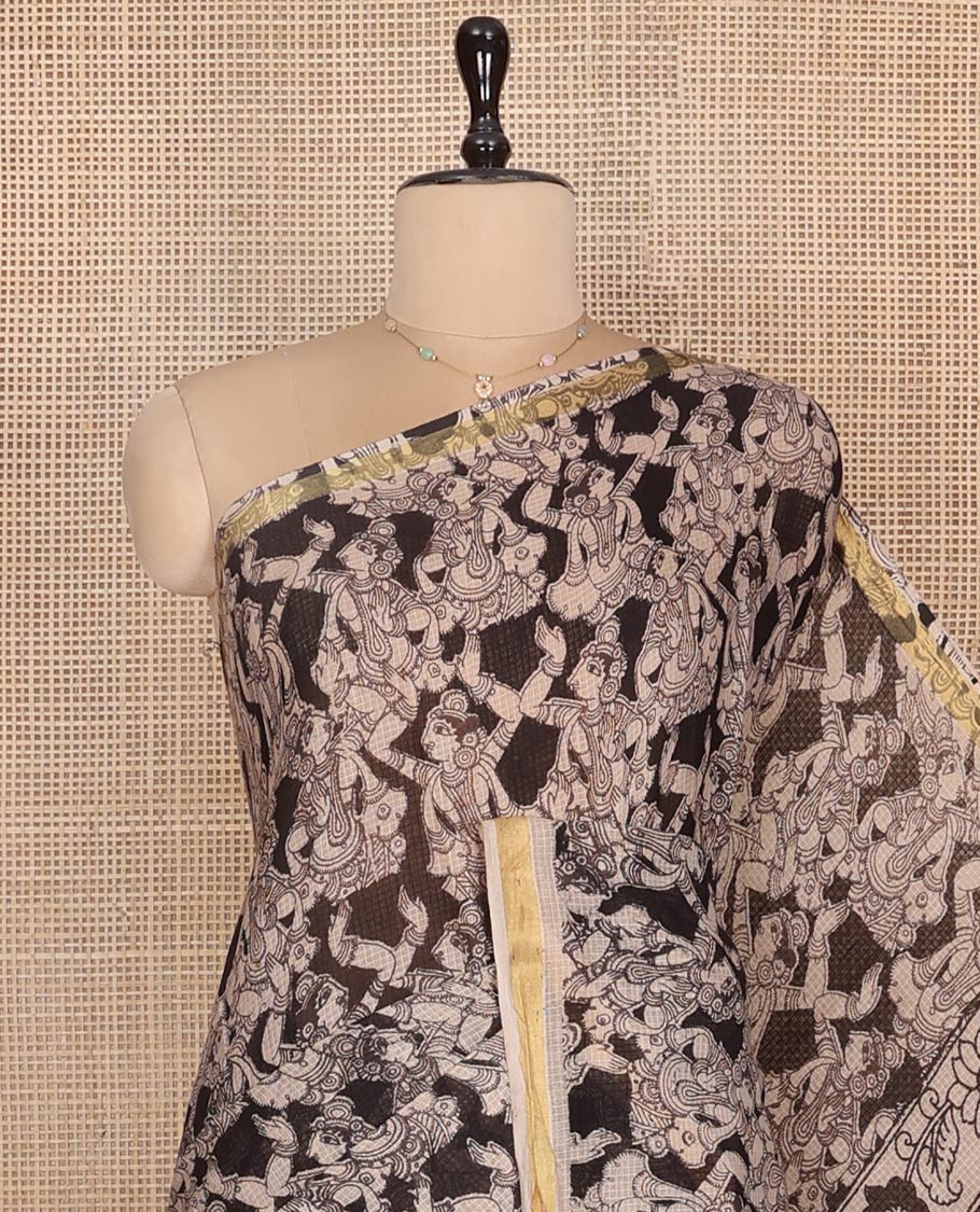 Black Machine-Printed Kalamkari Cotton Saree Features Human Motifs, a Piping Border, Pallu of Peacocks, and a Matching Blouse