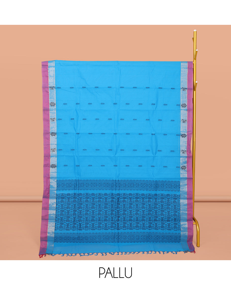 Blue Kanchi Cotton Saree, Enthralled with Buttas All Over Its Body, Complemented by a Contrast Border, Pallu of Paisley and Floral Design, and Paired with a Matching Blouse