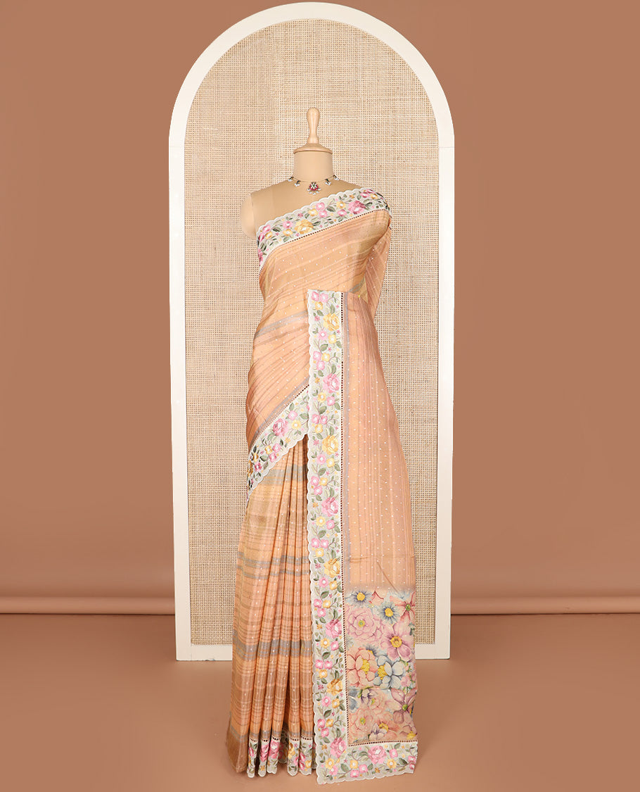 Pastel orange dobby-style buttas dola silk saree, contrast floral embroidered scallop border, and floral printed pallu