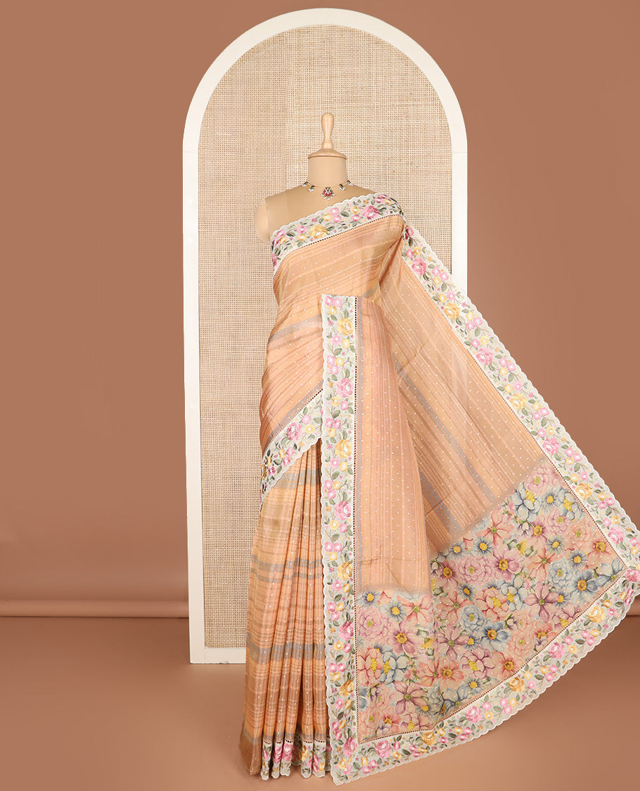 Pastel orange dobby-style buttas dola silk saree, contrast floral embroidered scallop border, and floral printed pallu