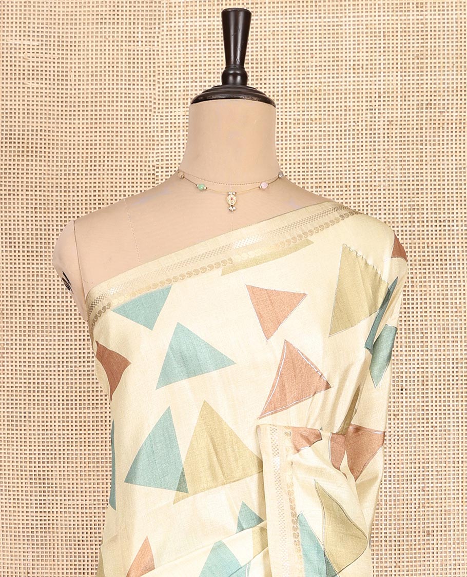Light Yellow Fancy Tussar Silk Saree Features Triangle Motifs, Zari Border, Striped Pallu, Matching Blouse
