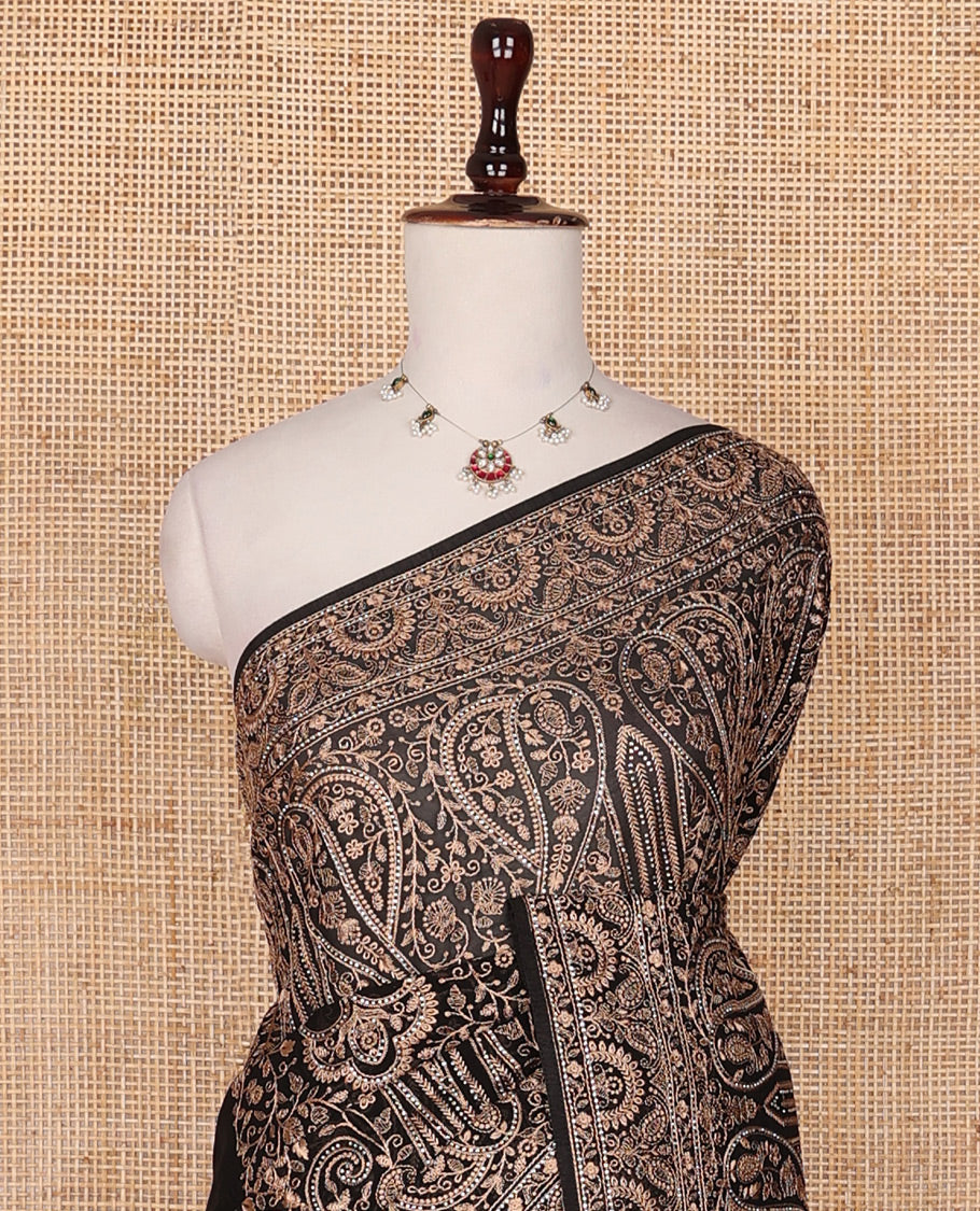 Black base antique gold thread embroidered designer saree features Mughal style floral, and paisleys